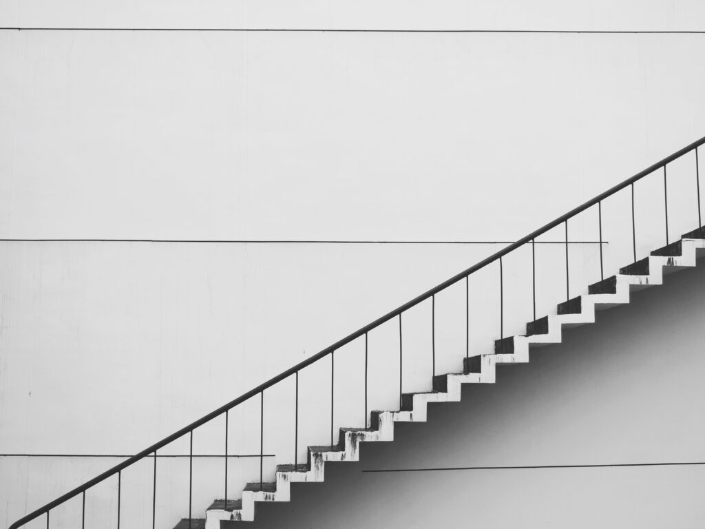 Photo by Pixabay: https://www.pexels.com/photo/white-stairs-wallpaper-434645/